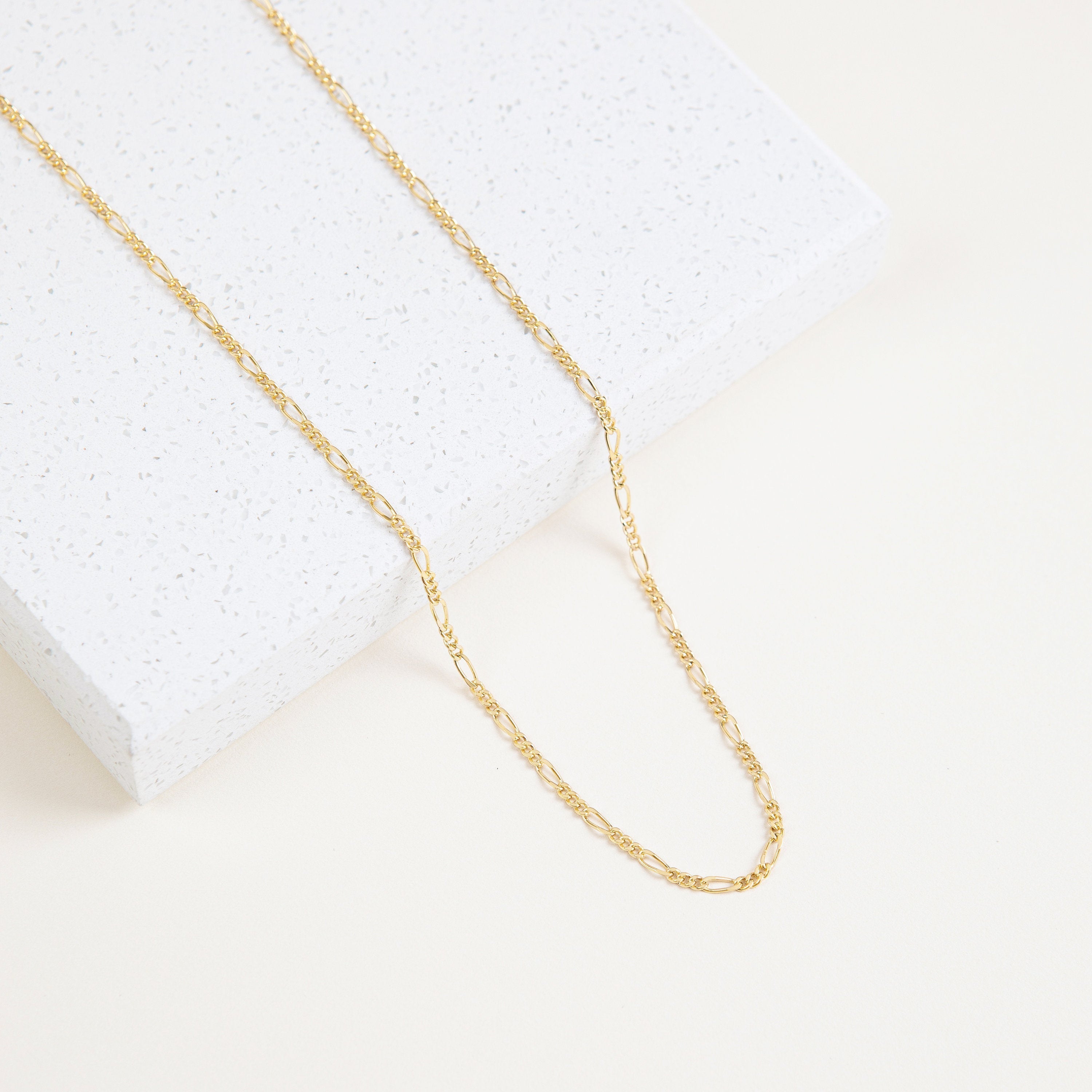 Delicate Figaro link necklace.